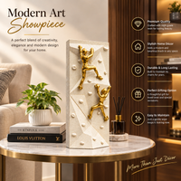 Anupam Premium Golden Rock Climbing Couple Showpiece with White Textured Base | Motivational Home & Office Decor
