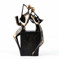Anupam Premium Abstract Couple Reading Book Showpiece | Black & Gold Modern Home and Office Décor Figurine