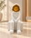 Anupam white and gold seated figurine front view