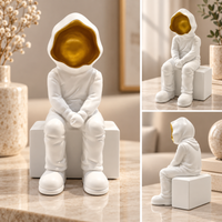 Anupam white and gold seated figurine multi angle views