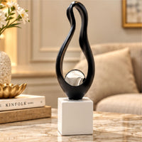 Anupam black abstract figurine with silver accent ball lifestyle view