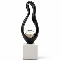 Anupam black abstract figurine with silver accent ball white background
