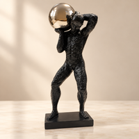 Anupam black and metallic silver abstract man figurine lifestyle view