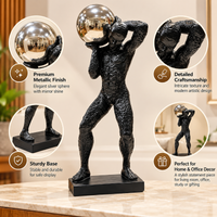 Anupam black and metallic silver abstract man figurine features