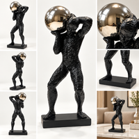 Anupam black and metallic silver abstract man figurine multi angle views