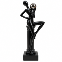 Anupam black abstract lady figurine with silver sphere on white background