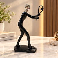 Anupam modern black tennis player figurine with metallic silver head lifestyle view