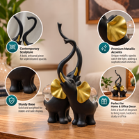 Anupam elephant figurine set features and metallic accents