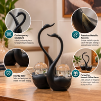 Anupam black swan pair figurine features and metallic accents