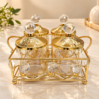Anupam Gold Four Glass Jar Dry Fruit, Spice & Mukhwas Storage Set with Crystal-Style Knob Lids and Twin-Handle Metal Basket — image 1