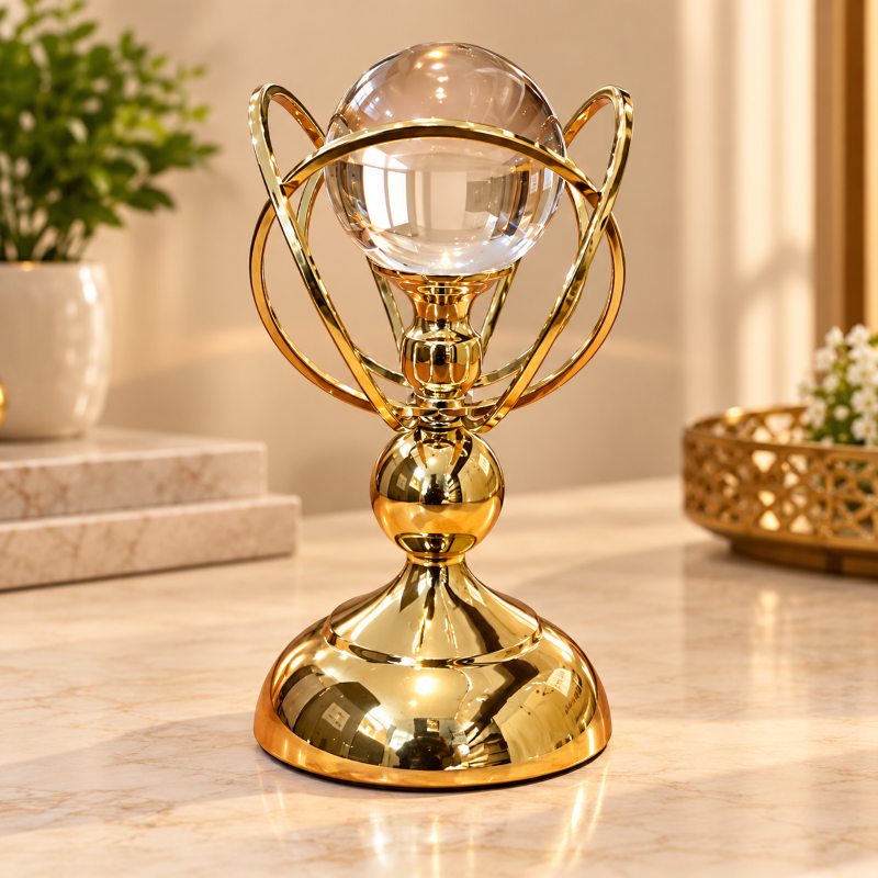 Anupam Gold Glass Orb Showpiece with Interlocking Metal Rings & Pedestal Base – 9.5 x 6 x 6 Inches (H x W x L)