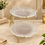 Anupam Gold Two Tier Glass Serving Stand with Curved Metal Frame & Hanging Accents, Gold Metal & Glass - product image 1