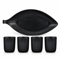 Anupam black leaf serving tray with four tumblers on white background