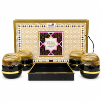Anupam New Hammer Exclusive black gold jar and tray set on white background