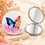 Anupam Blue Butterfly & Pink Floral Glitter Round Pocket Mirror, Folding Dual Mirror for Handbag, Makeup & Travel, image 1