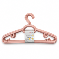 Pink plastic clothes hanger